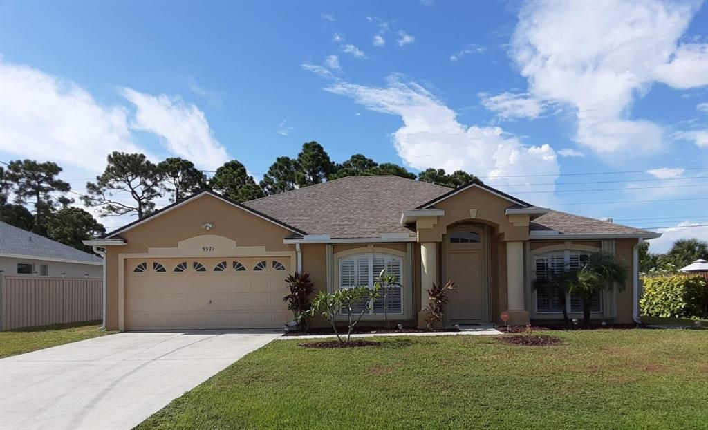 Photo of 5971 NW Baynard Drive Dr, Port Saint Lucie, FL 34986 (MLS # R10824907)