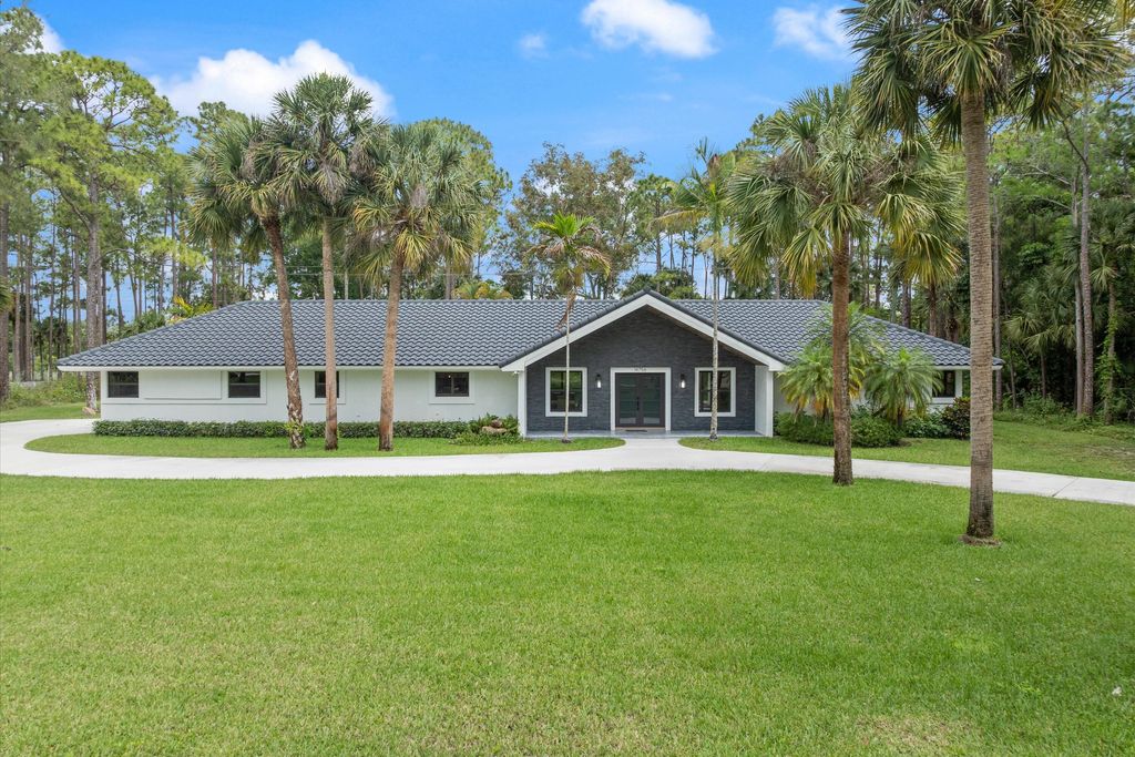 Photo of 14756 Stirrup Lane, Wellington, FL 33414 (MLS # B26020722)