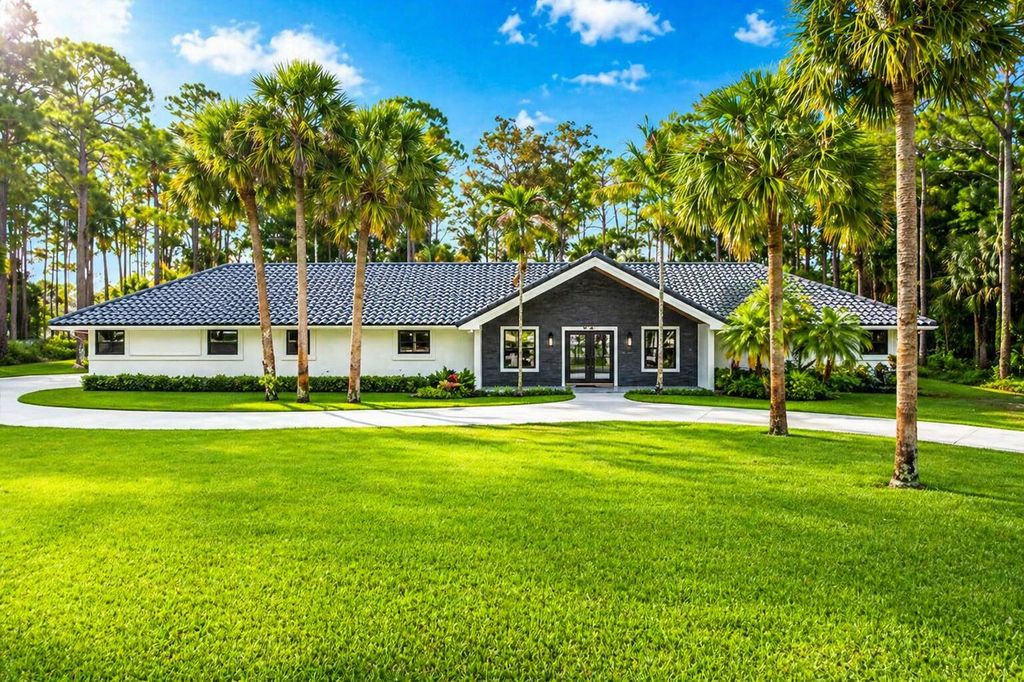 Photo of 14756 Stirrup Lane, Wellington, FL 33414 (MLS # B26020722)
