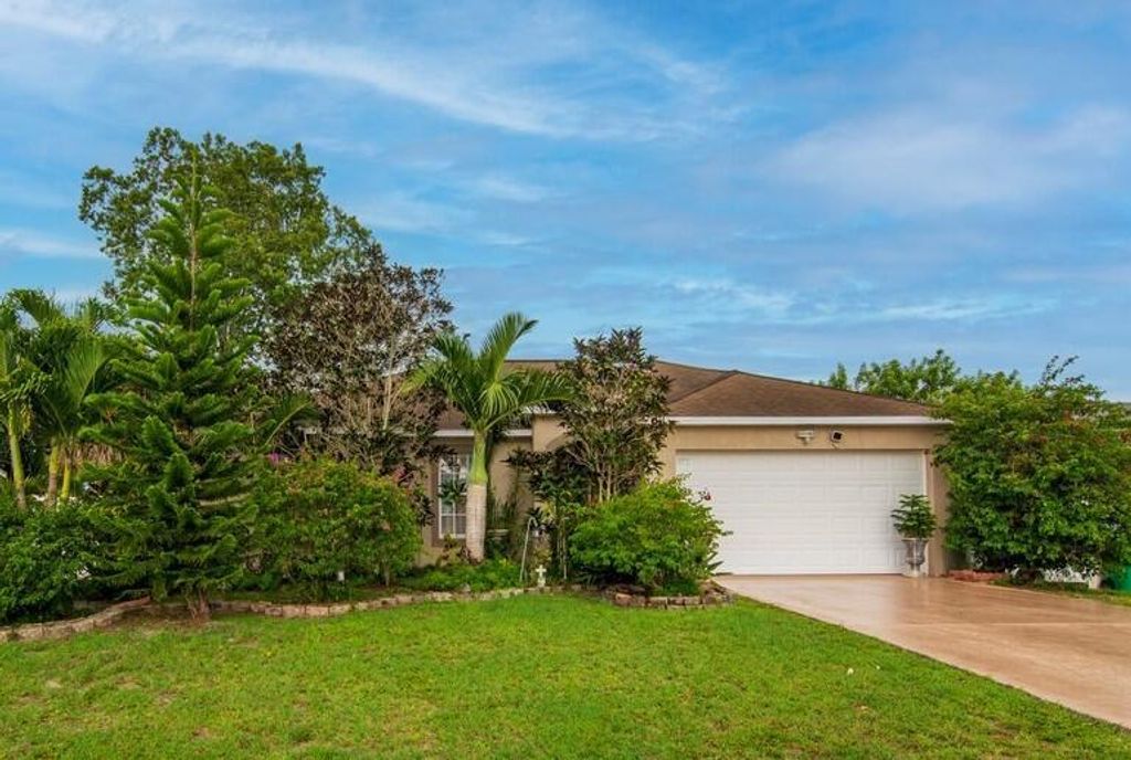 Photo of 3425 SW Ronald Street, Port St Lucie, FL 34953 (MLS # R10897386)