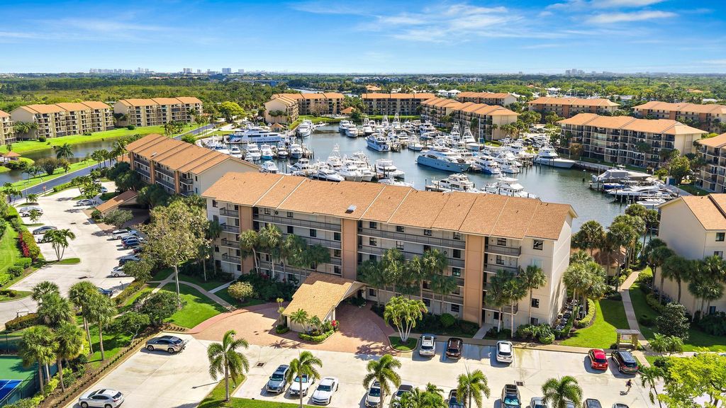 Photo of 1501 Marina Isle Way #202, Jupiter, FL 33477 (MLS # B26010756)