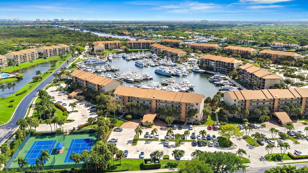 Photo of 1501 Marina Isle Way #202, Jupiter, FL 33477 (MLS # B26010756)