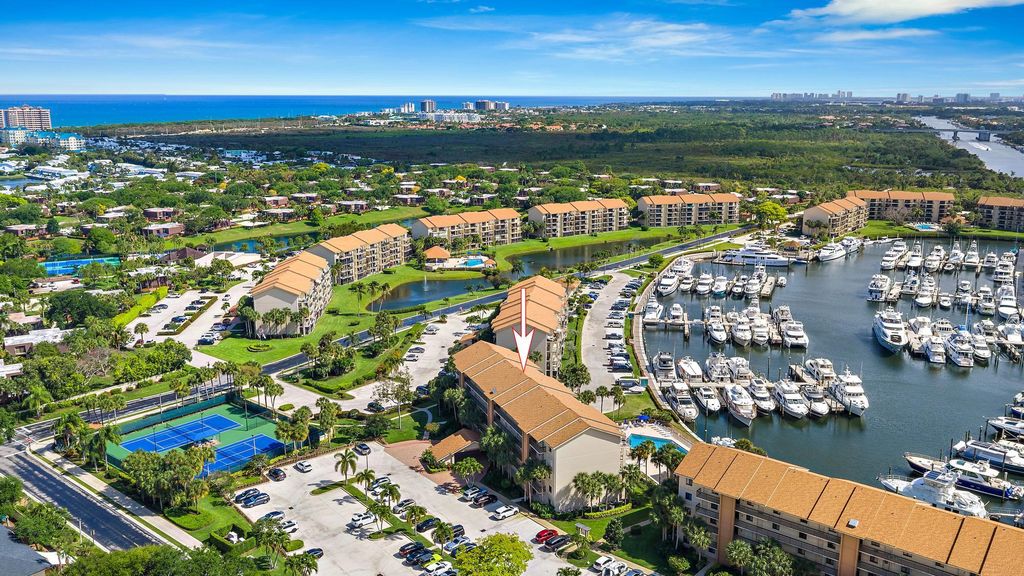 Photo of 1501 Marina Isle Way #202, Jupiter, FL 33477 (MLS # B26010756)