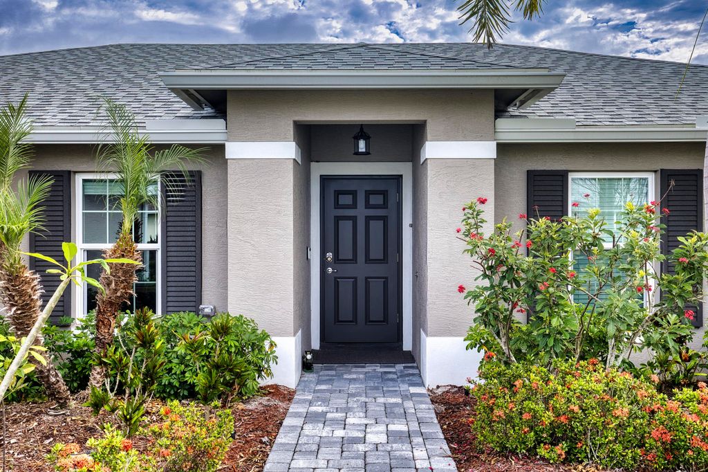 Photo of 375 SW Vista Lake Drive, Port Saint Lucie, FL 34953 (MLS # B26028444)
