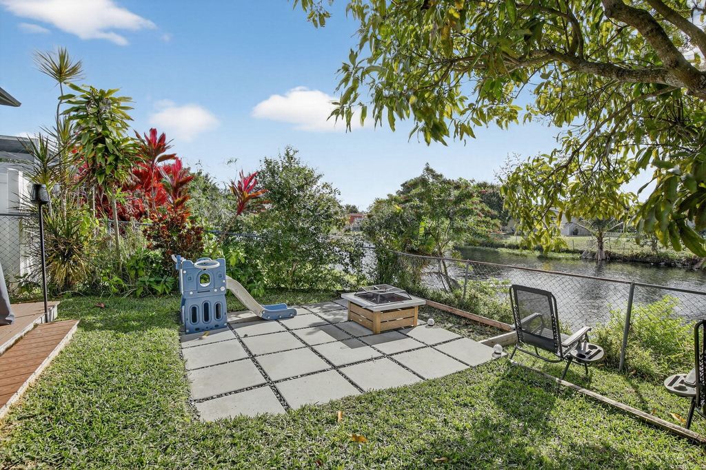 Photo of 9630 NW 21st Manor, Sunrise, FL 33322 (MLS # R11149323)