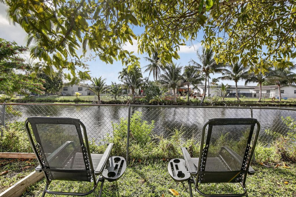 Photo of 9630 NW 21st Manor, Sunrise, FL 33322 (MLS # R11149323)