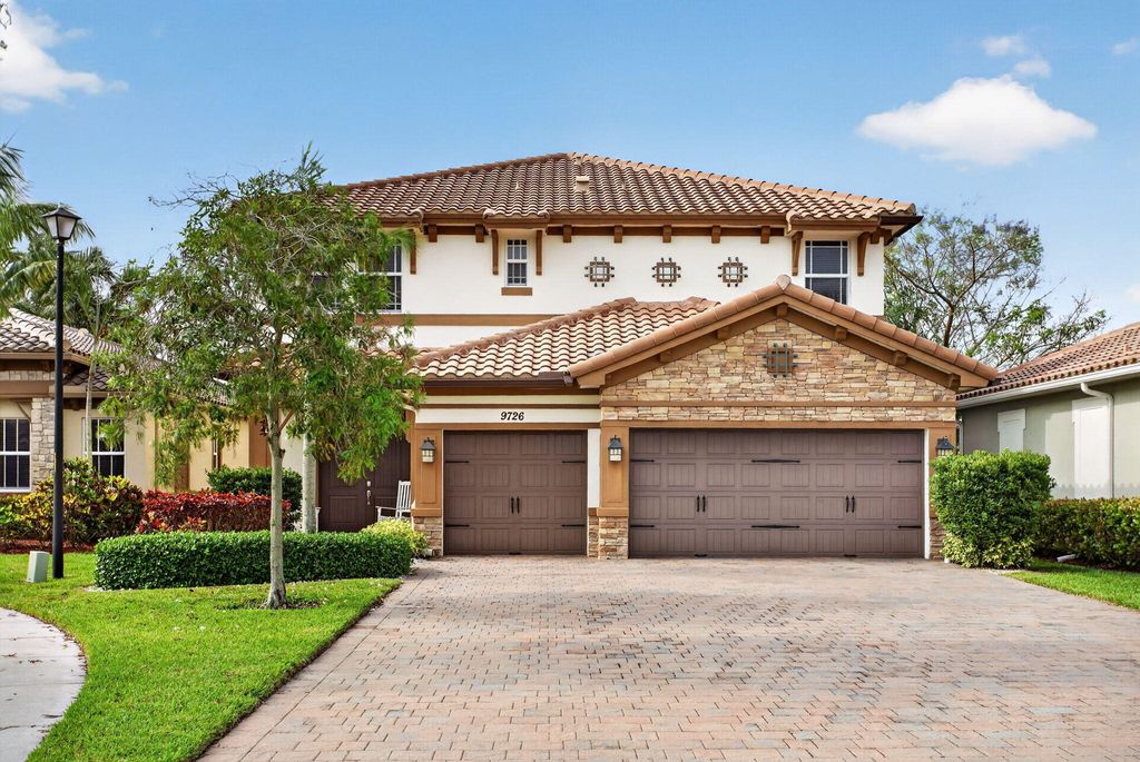 Photo of 9726 Blue Isle Bay, Parkland, FL 33076 (MLS # B26024321)