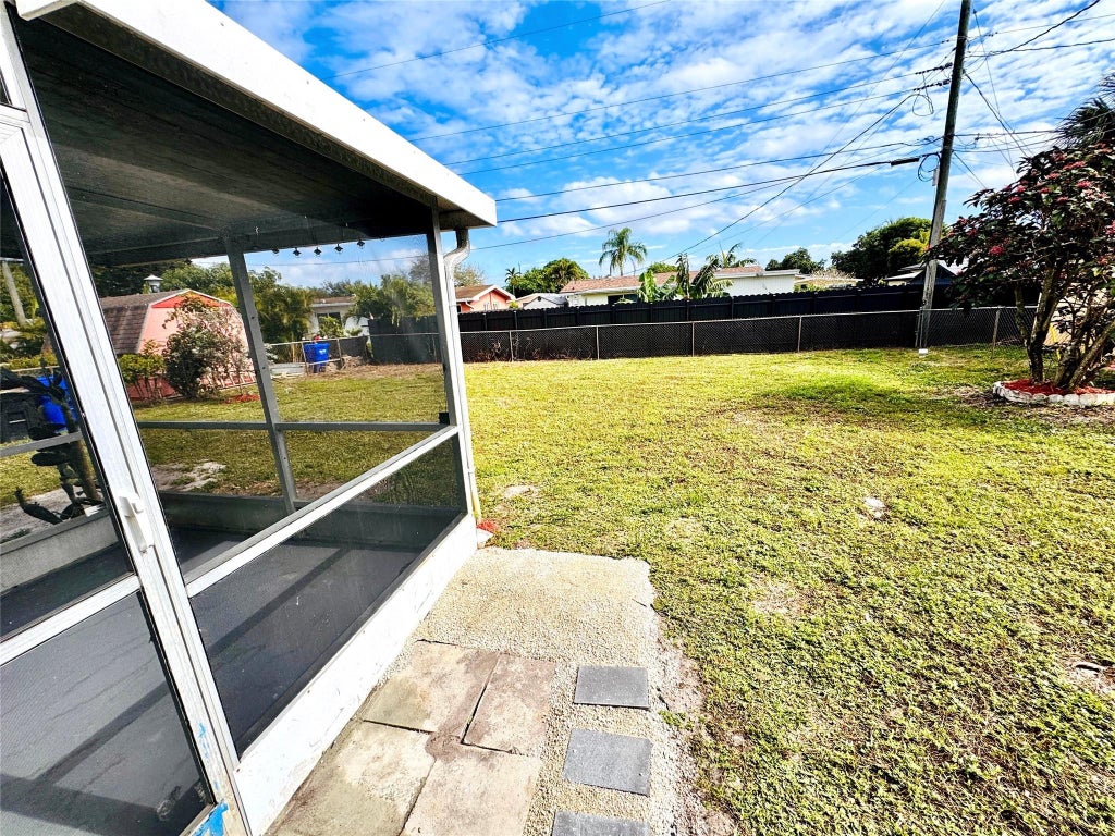 Photo of 1411 NW 79TH Way, Pembroke Pines, FL 33024 (MLS # B26079522)