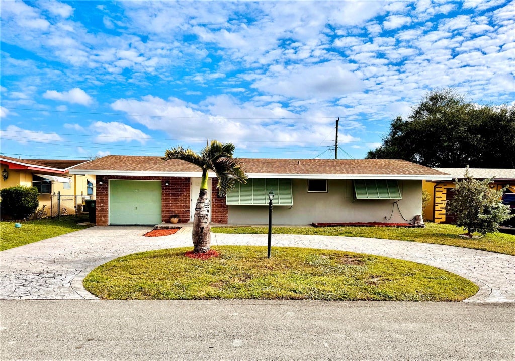 Photo of 1411 NW 79TH Way, Pembroke Pines, FL 33024 (MLS # B26079522)