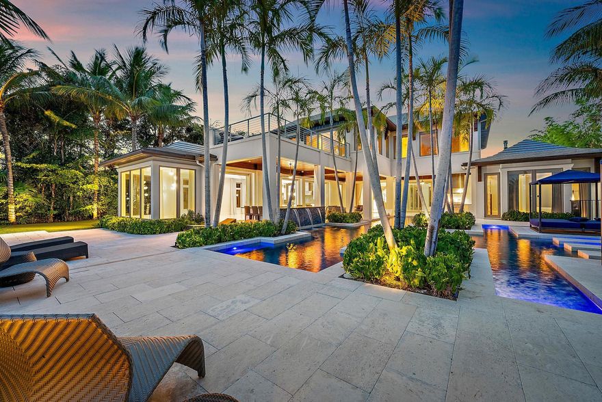 Live the ultimate waterfront lifestyle at 177 Commodore Drive. Dock your 94' yacht steps from your door, entertain effortlessly with a resort-style pool, putting green, and luxe outdoor lounges. Inside, 5 ensuite bedrooms, smart tech, designer touches, and an entertainer's kitchen define sophistication. All within Jupiter's prestigious Admirals Cove.  Admirals Cove offers an unparalleled lifestyle with world-class amenities: 45 holes of championship golf, 9 pristine tennis courts, and pickleball courts for year-round recreation. Indulge in resort-style relaxation with a spa, pool, and fitness center, or enjoy casual dining at 4 exquisite restaurants. With a vibrant dog park, playground, and a luxurious hotel, this exclusive community is where luxury meets leisure at every turn.