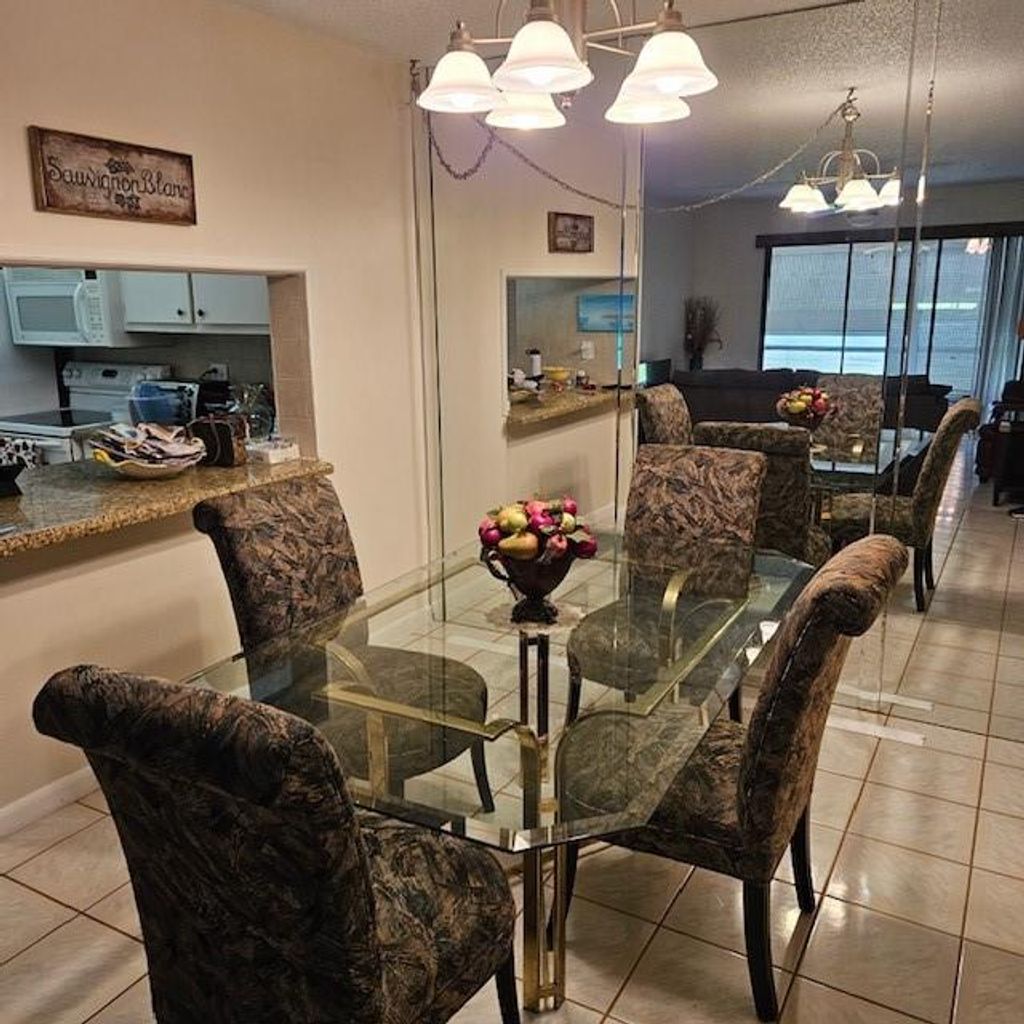 Photo of 806 Sky Pine Way #F1, Greenacres, FL 33415 (MLS # F10443735)