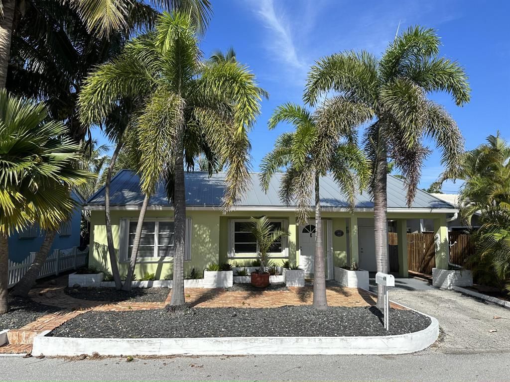 Photo of 49 Douglas Drive, Ocean Ridge, FL 33435 (MLS # R10864193)