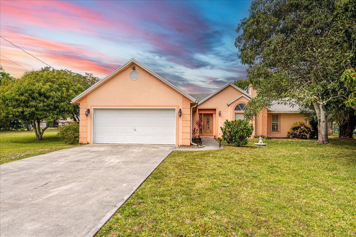 Tucked away on a rare half-acre lot with stunning canal views, this CBS-built 3-bedroom, 2-bath home offers the perfect mix of space and convenience. With plenty of room to add a pool or workshop, this property is ready for you to create ideal home. Located east of US-1, you're just minutes away from shopping, dining, and entertainment, as well as the vibrant areas of Jensen Beach and Downtown Stuart, Opportunities like this don't come around often! schedule your private showing now!