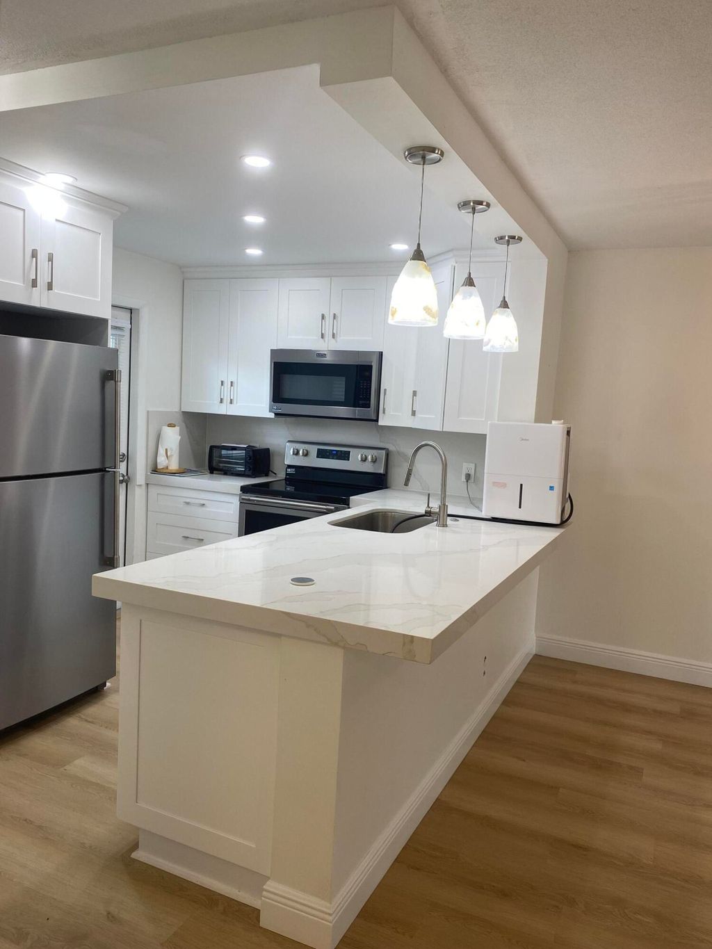 Photo of 2121 NE 1st Court #106, Boynton Beach, FL 33435 (MLS # R11163120)