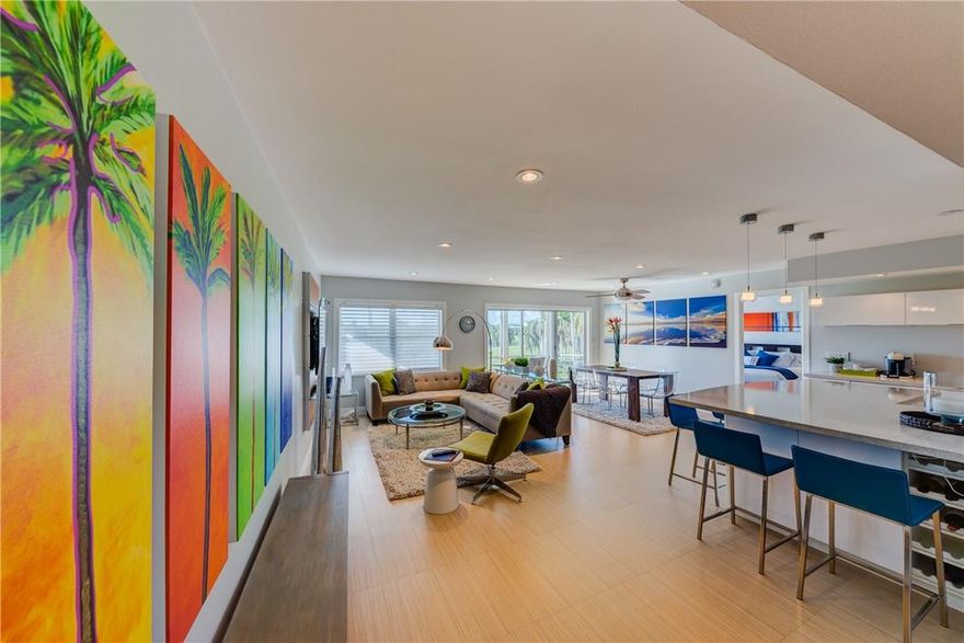 Sleek, sparkling 2/2 condo freshly updated with a spacious & functional layout. All-white kitchen features quartz countertops, 2 ovens, & breakfast bar. Master bedroom features large walk-in closet with custom cabinetry & organization. Both bathrooms tastefully renovated, tile floors throughout, ceiling fans, recessed lighting, Nest thermostat/temperature control, remote-controlled window blinds, & golf course view from screened-in balcony. KeyFob building entry available. 10-minute walk to Beach!