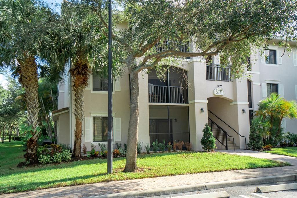 Photo of 3021 Alcazar Place #104, Palm Beach Gardens, FL 33410 (MLS # R10730370)