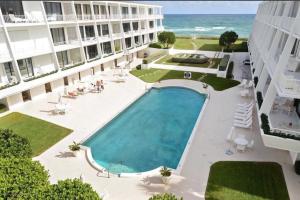 Beautifully decorated furnished 2 bedroom condo at The Reef in South Palm Beach. Available January 2nd until June 1. Large balcony with partial ocean views.