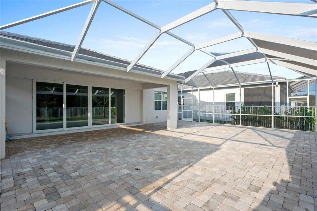 Photo of 9915 SW Meridian Way, Stuart, FL 34997 (MLS # R11154629)