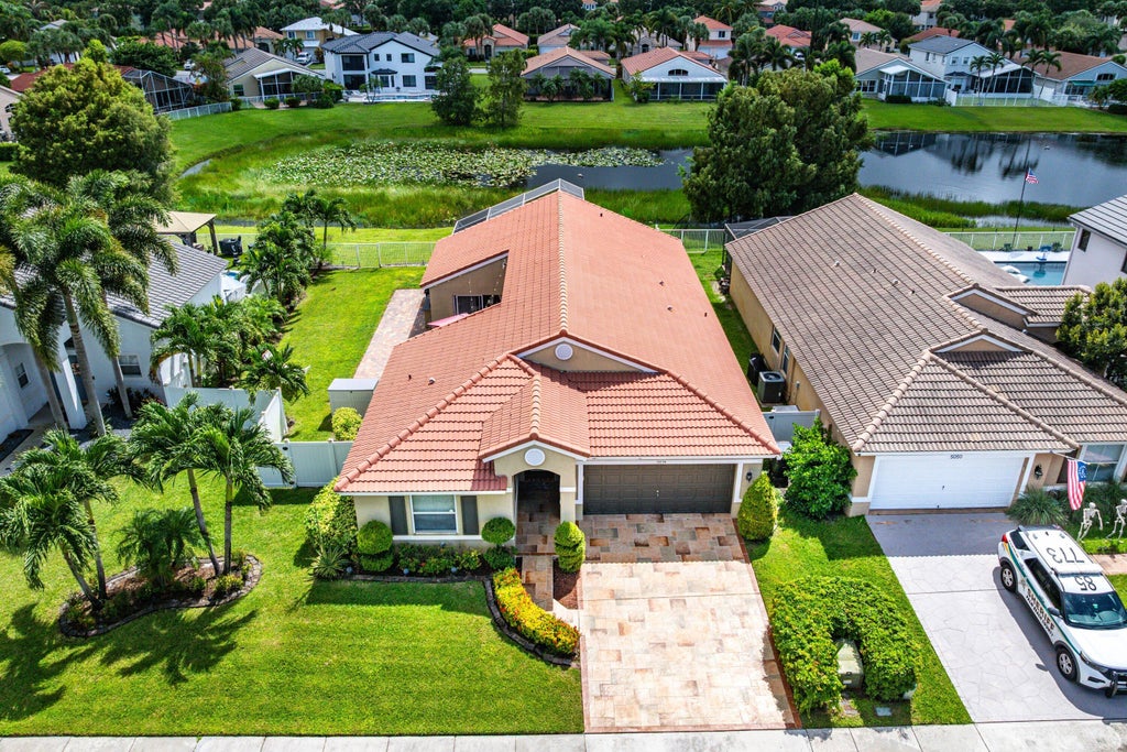 Photo of 5054 Prairie Dunes Village Circle, Lake Worth, FL 33463 (MLS # B26081691)