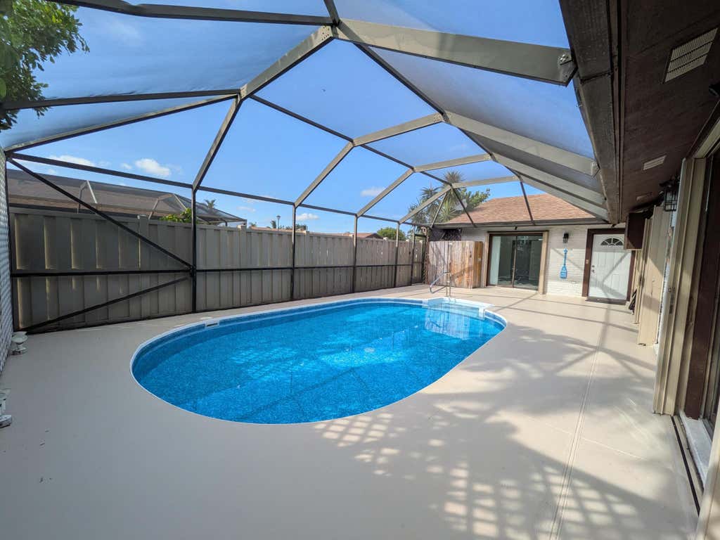 Photo of 9975 Boca Gardens Trail #A, Boca Raton, FL 33496 (MLS # B26039648)