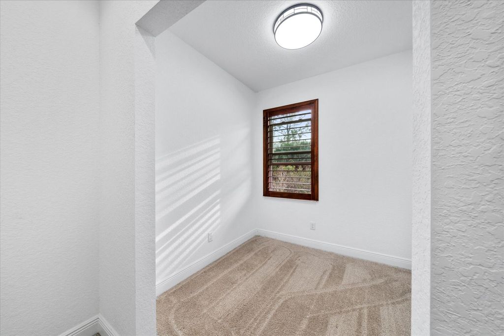 Photo of 1007 NE Trailside Run Run, Port Saint Lucie, FL 34983 (MLS # R11160389)