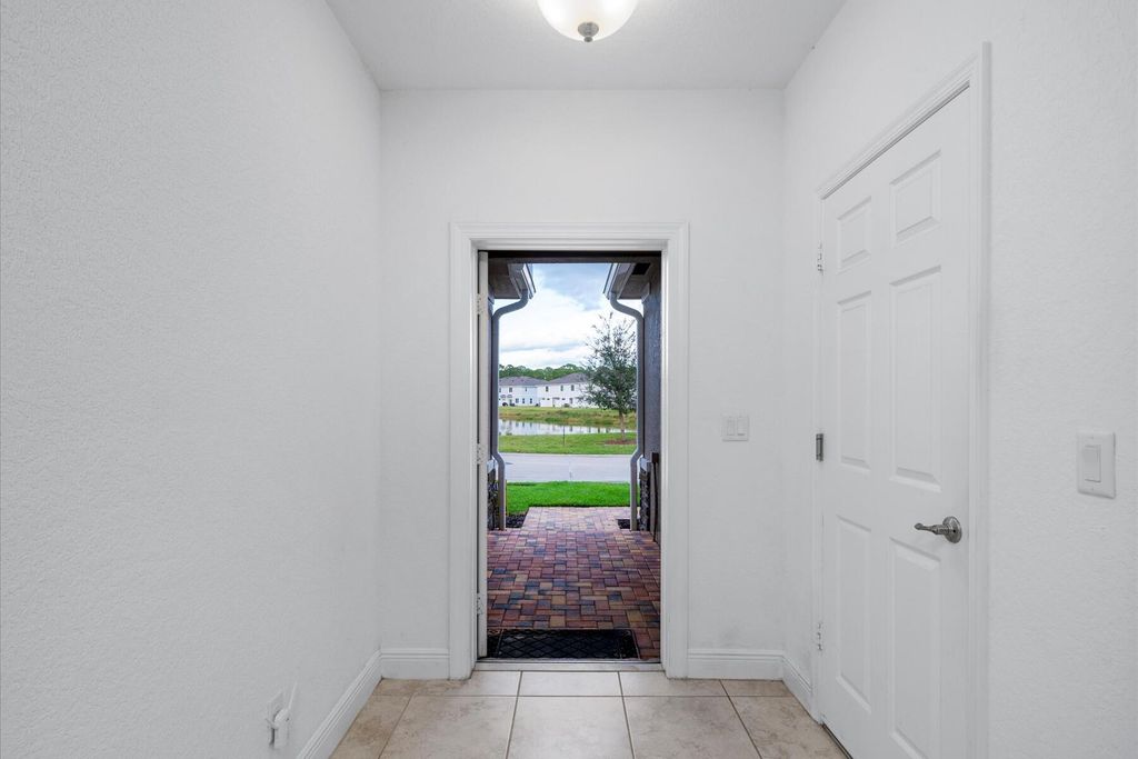 Photo of 1007 NE Trailside Run Run, Port Saint Lucie, FL 34983 (MLS # R11160389)