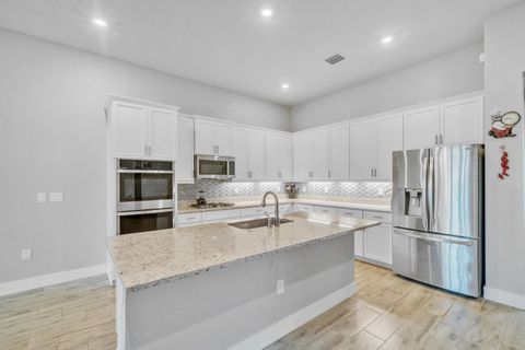 Tiny photo for 7524 N Blue Spring Drive, Parkland, FL 33067 (MLS # B26039719)