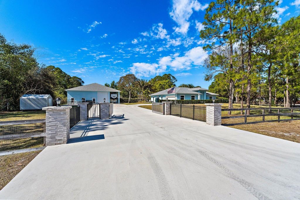 Photo of 2505 162nd Drive N, Loxahatchee, FL 33470 (MLS # R11160764)