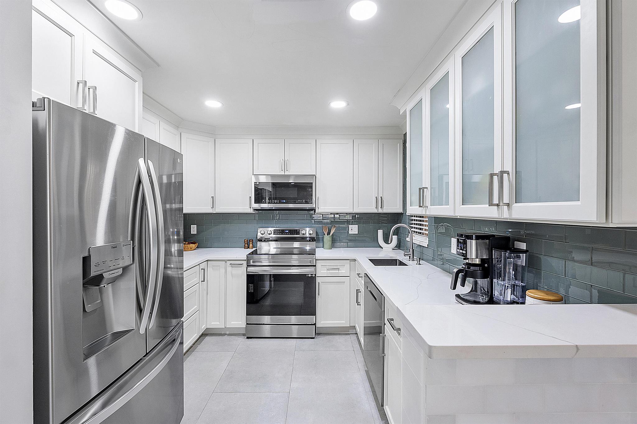 FEATURED HOME IN THE TOWNSHIP PARADE OF HOMES.*** $3,000 CREDIT TO BUYER AT CLOSING***Welcome to this updated 3/2 first-floor unit in the desirable Karanda Village community of Coconut Creek. Renovated in 2024, it features sleek porcelain tile throughout, an open layout, modern kitchen with quartz countertops, ample cabinet and counter space, new stainless steel appliances, Both bathrooms have been fully updated with stylish finishes.Enjoy your own private patio, assigned parking, and access to great amenities: pool, playground, and clubhouse.Move-in ready and perfectly located, don't miss this one!