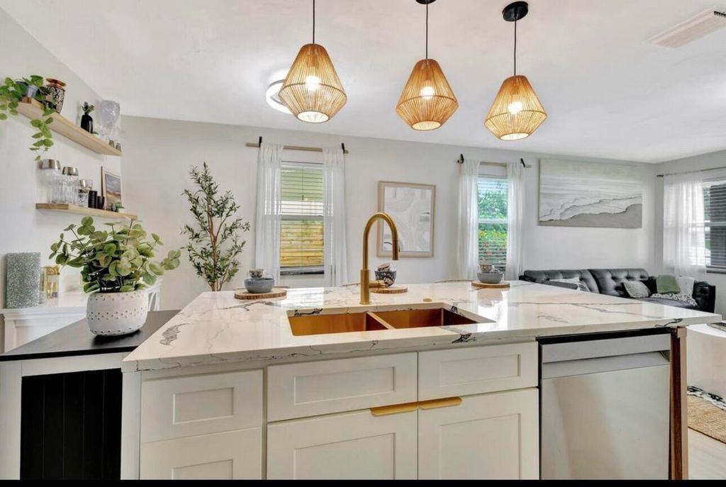 Photo of 115 W 31st Court, Riviera Beach, FL 33404 (MLS # R11167660)