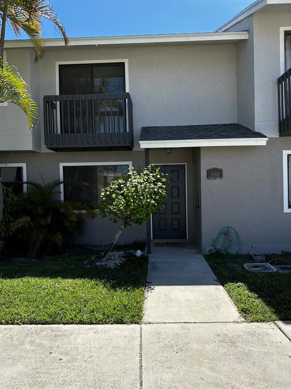 Photo of 1605 Wharf Lane, Greenacres, FL 33463 (MLS # R10886466)