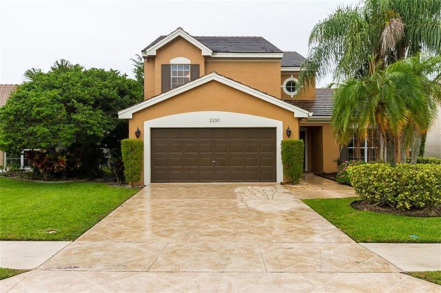 Beautiful lakefront pool home in great school districts! 1 bedroom/office + full bathroom downstairs & 3/2 upstairs. New roof '08 & huge screened pool enclosure. New A/C 2016! Master bathroom fully remodeled w/ separate his/hers vanities, separate shower & jacuzzi tub. Tile & wood floors throughout - NO CARPET! Prime cul de sac location. Upgraded kitchen features real wood cabinets and newer appliances. Downstairs bathroom fully remodeled - nothing to do but move right in! Community of only 74 homes!