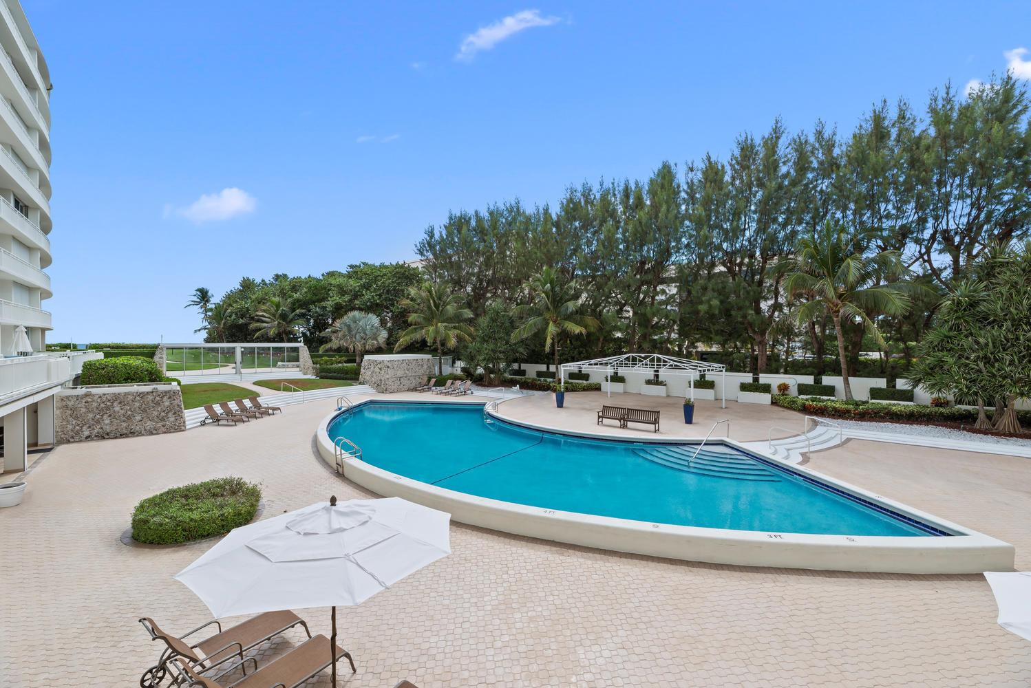 Sought-after high-floor corner unit with stunning views of both the ocean and Intracoastal. This spacious 2-bedroom, 2-bath residence features a front-to-back living room, formal dining area, split bedroom layout, and two balconies. Enjoy resort-style amenities including a pool, sauna, exercise room, and doorman service. Located in the Ambassador II, just north of the Lake Worth Bridge, with easy beach access and nearby dining and shopping. Easy to show!