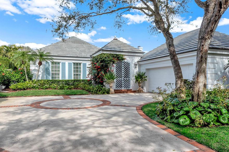 Located in the exquisite gated community of John's Island. Rarely available freshly updated courtyard home steps from the beach. Meticulously landscaped grounds surround this sumptious retreat and tropical pool oasis. Discover a harmonious blend of sophistication, elegance, privacy and comfort as you explore the luxurious Primary Suite + 2 ensuite Guest Bedrooms. Natural light abounds in the dramatic Entry Foyer, Great Room, and culinary dream Kitchen. Special features include impact glass, wine cooler, fireplace, propane tank, heated pool, outdoor entertaining, beach access.