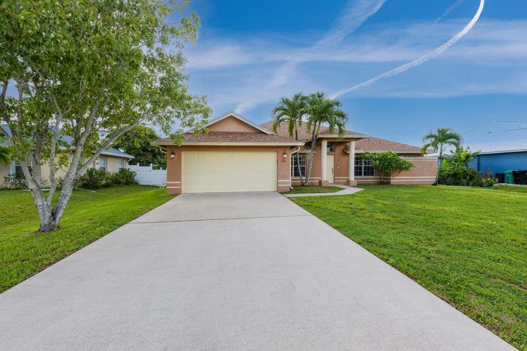 Photo of 1781 SW Finch Lane SW, Port Saint Lucie, FL 34953 (MLS # R11002414)