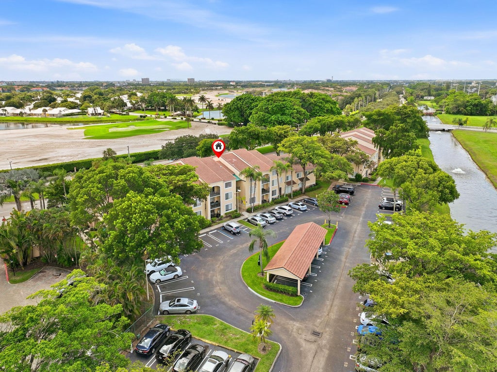 Photo of 1707 VILLAGE Boulevard #108, West Palm Beach, FL 33409 (MLS # B26063694)