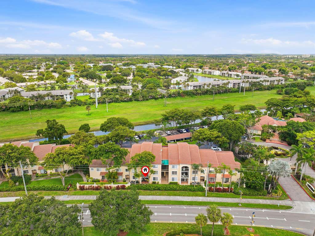 Photo of 1707 VILLAGE Boulevard #108, West Palm Beach, FL 33409 (MLS # B26063694)