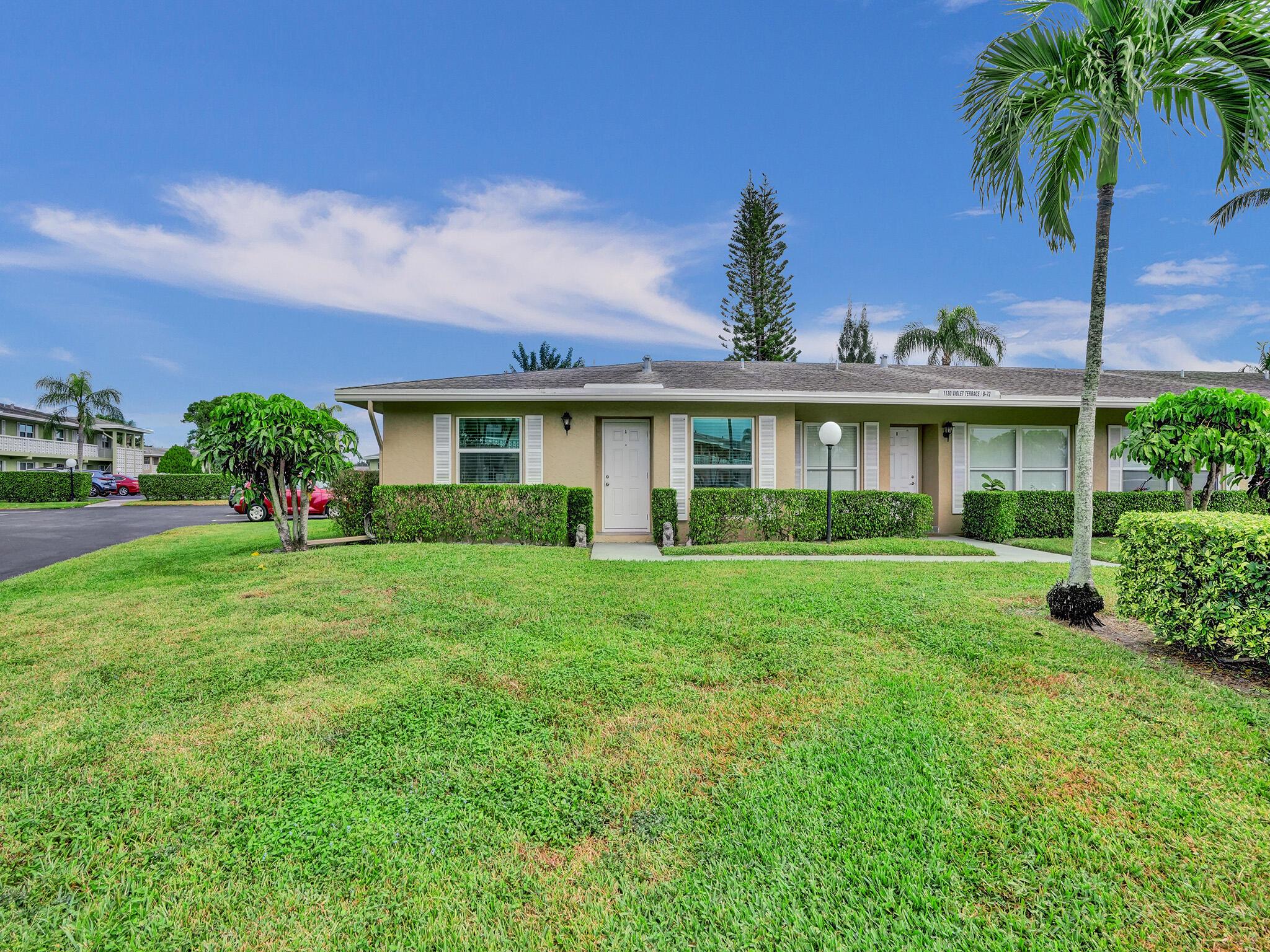FULLY RENOVATED in a transitional design style, this highly coveted 2 bedroom/ 2 bath CORNER VILLA offers almost 1200 sqft of interior space plus two 2022-built patios - a 16' x 10' screened patio and a 16' x 10' open air patio - each with its own sliding glass door entrance. Smooth surface ceilings throughout, 16 '' x 16'' white tile and ALL 2019-installed PGT impact glass windows and sliding doors await you. The eat-in kitchen boasts abundant white shaker cabinetry( all upper cabinets are 42''), a 17 ft long quartzite countertop, subway tile backsplash and a Krauss 10'' deep s/s sink ; plus there's a separate coffee bar with a 5 ft long mahogany counter, a Houzer prep sink and below the counter side-by- side washer and dryer. And the remodeled bathrooms both have step-in tiled shower