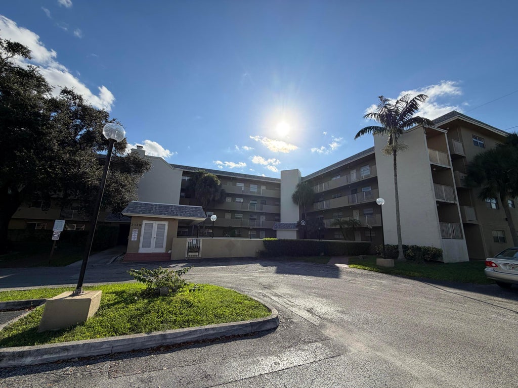 Photo of 3120 N PINE ISLAND Road #403, Sunrise, FL 33351 (MLS # B26089332)
