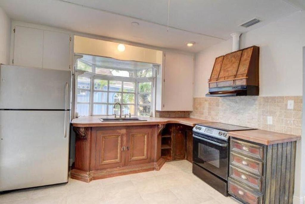Photo of 714 W Lakewood Road #A, West Palm Beach, FL 33405 (MLS # R11152650)
