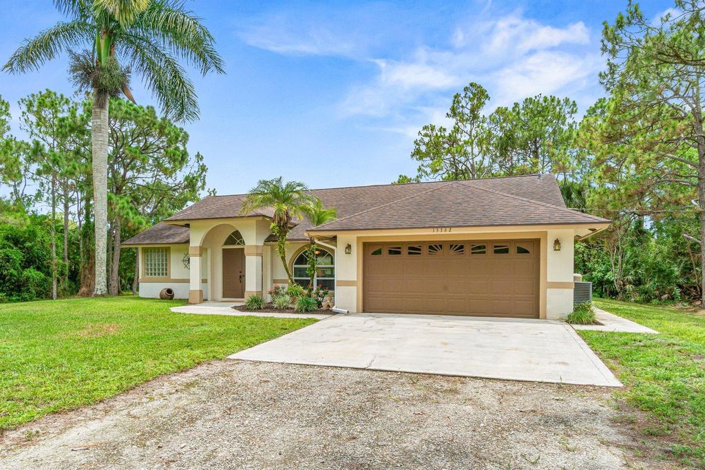 Photo of 15362 Tangelo Boulevard, Loxahatchee, FL 33470 (MLS # R11104868)