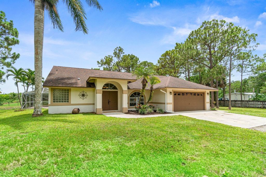 Photo of 15362 Tangelo Boulevard, Loxahatchee, FL 33470 (MLS # R11104868)