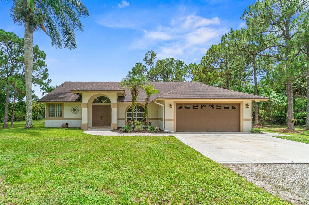 Photo of 15362 Tangelo Boulevard, Loxahatchee, FL 33470 (MLS # R11104868)