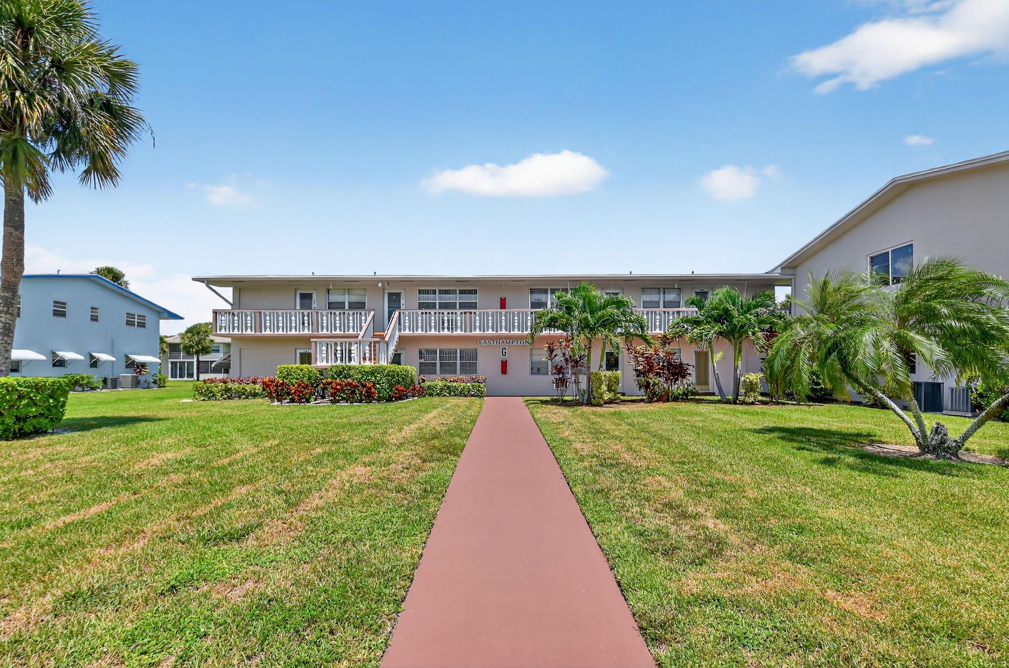 MOVE IN READY COZY 2 BED/ 1BATH SECOND FLOOR PARTIALLY FURNISHED UNIT VERY CLEAN GREAT ASSOCIATION BUILDING HAS BEEN UPGRADED FRESHLY PAINTED 5 YEAR OLD ROOF NO ASSESSMENTS. ENJOY THE OUTDOORS ON THE ASSOCIATIONS OPEN PATIO. Roomy closets (one walk-in), screened-in lanai, laundry room, assigned parking spot plus visitor parking available; local bus for errands/shopping both within & outside the village. GREAT LOCATION VERY CLOSE TO THE CLUBHOUSE. COME AND ENJOY RESORT STYLE LIVING IN THIS GATED COMMUNITY FOR ADULTS 55+ CLUBHOUSE features a theater, indoor pool, card room, community/party room, billiard room ,shuffle board ,tennis , pickleball ,bocce and two outdoor pools. Numerous heated outdoor pools throughout the community. Separate fitness center with gym , outdoor heated pool and