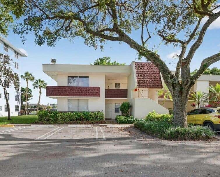 Photo of 3200 N Course Lane #116, Pompano Beach, FL 33069 (MLS # B26065597)