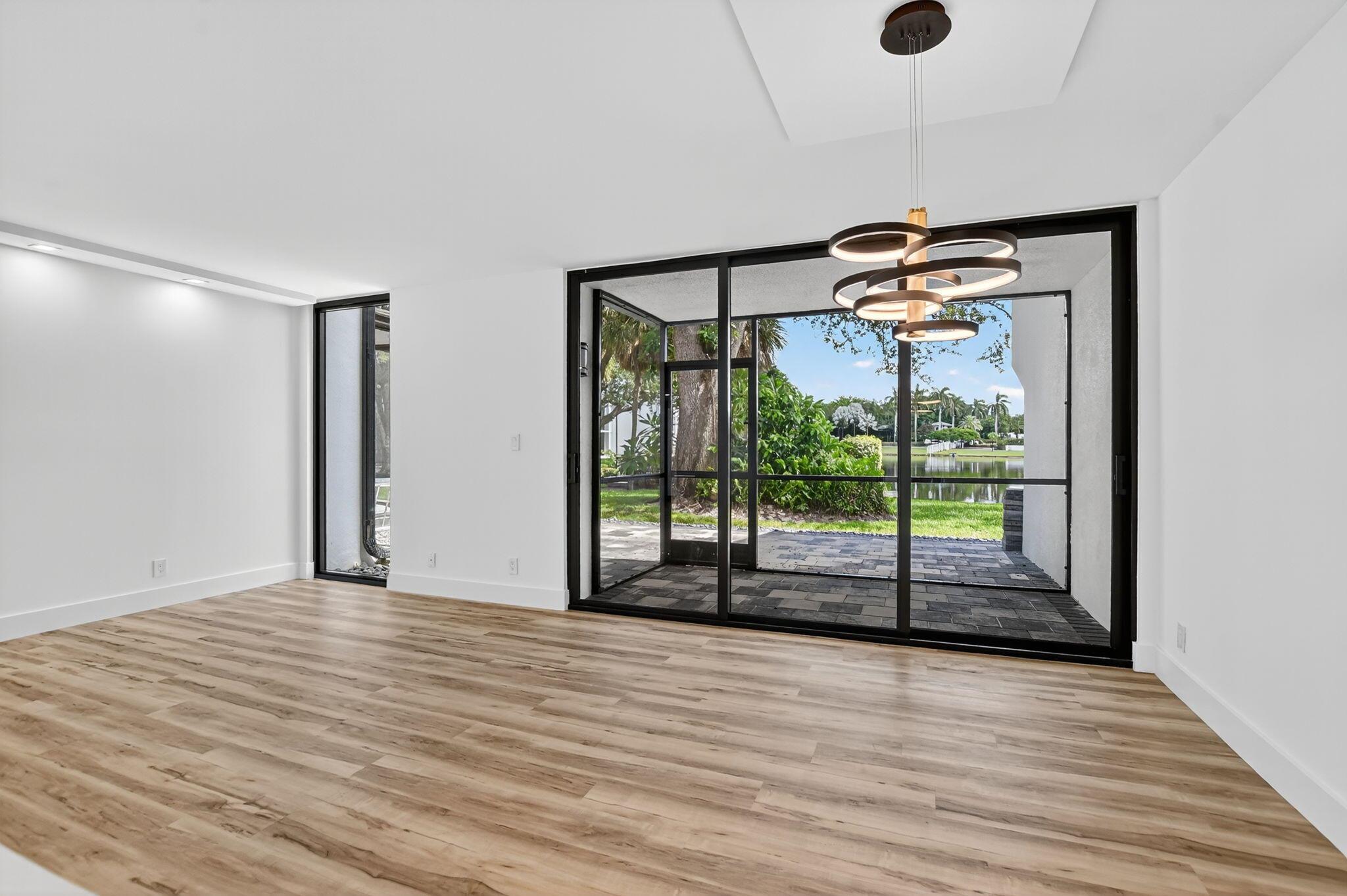 This beautifully renovated Townhouse is move-in ready and offers forever lake views. Featuring a brand-new roof, new fencing, and a fresh new look for Pinelake, This home combines modern style with ultimate comfort.Step outside to enjoy an extended back patio, relax or entertain, The home is ideally located--just steps from the village pool, & walk to amenities.The photos show multiple ways to design your home.~ Imagine life inside the Nation's #1 Private Residential Country Club Lifestyle offering resort-style living Conveniently located less than 10 minutes from downtown Boca Raton. PLAY our 4 Golf courses, 27 Tennis courts and 14 Pickleball courts; golf and tennis pro shops, DINE in our 8 venues. Mandatory Joining Fee:$150,000, BWMA Capital Contribution: $10K, Social Dues: $24,454.