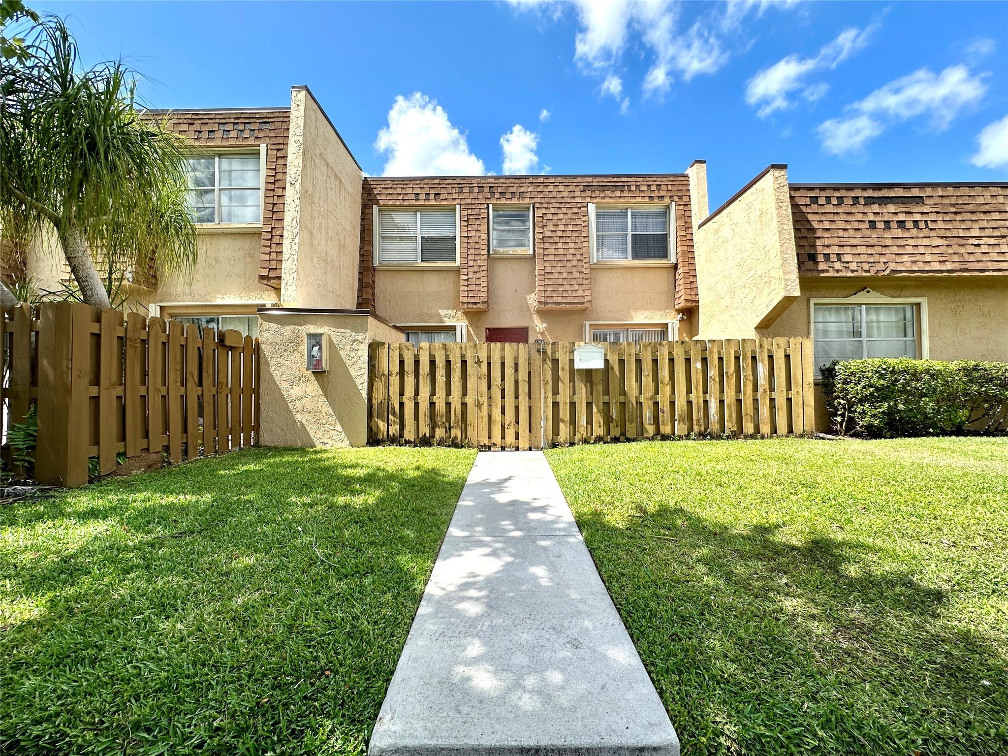 This is a great find for a family. Light and airy layout. Charming lake views and a welcoming atmoshphere will make
this a wonderful home. This 2 bedroom and 2.5 bathroom has tile floors throughout. Enclosed patio and fenced
porch. Near Sawgrass Mills Mall and Sawgrass expressway. Great for a family starting their climb up the property
ladder or for an investor.