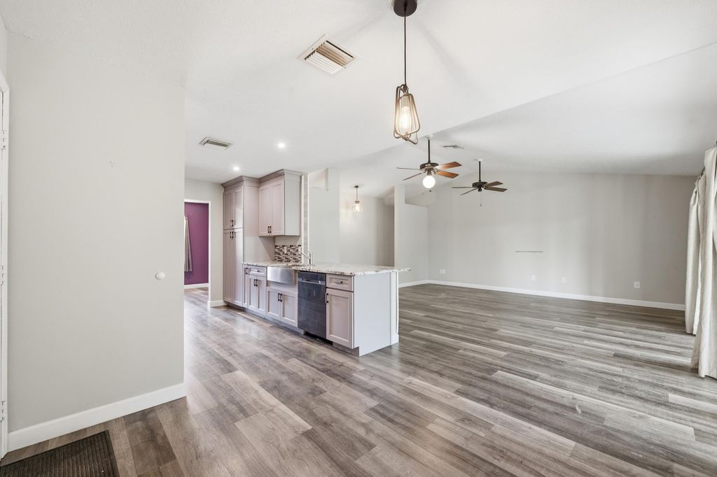 Photo of 2261 SE Southeast Glover St, Port Saint Lucie, FL 34984 (MLS # B26000926)