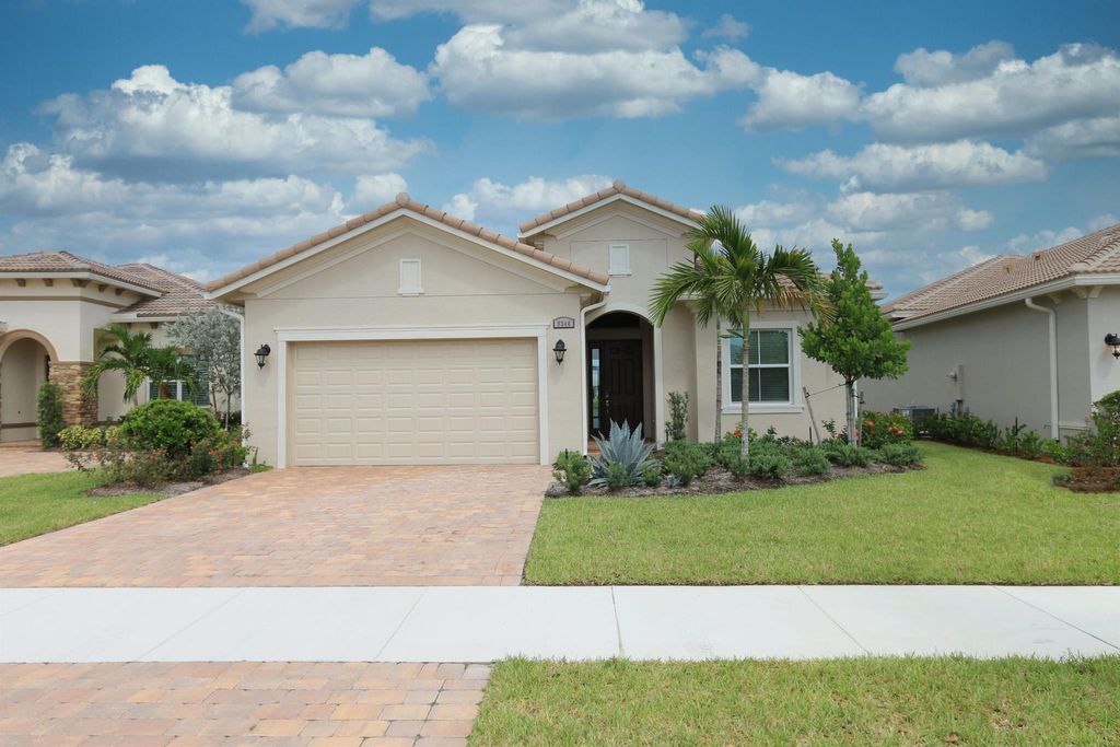 Photo of 9344 SW Pepoli Way, Port St Lucie, FL 34987 (MLS # R10924653)
