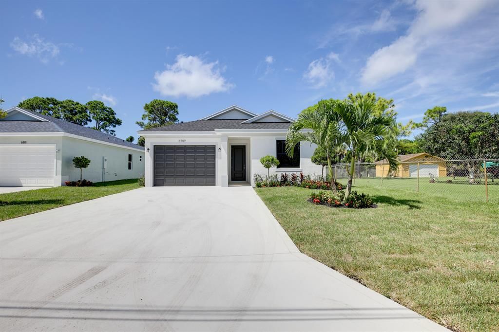 Photo of 6789 Australian Street, Jupiter, FL 33458 (MLS # R10747831)
